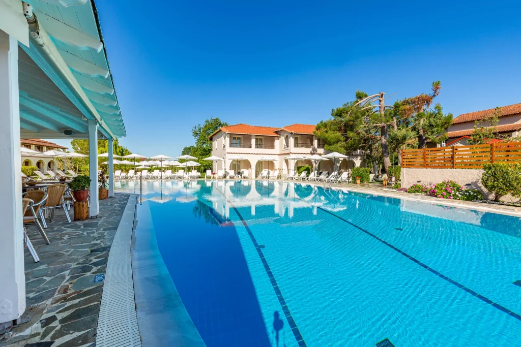 kamari apartments corfu acharavi pool sunbeds daytime
